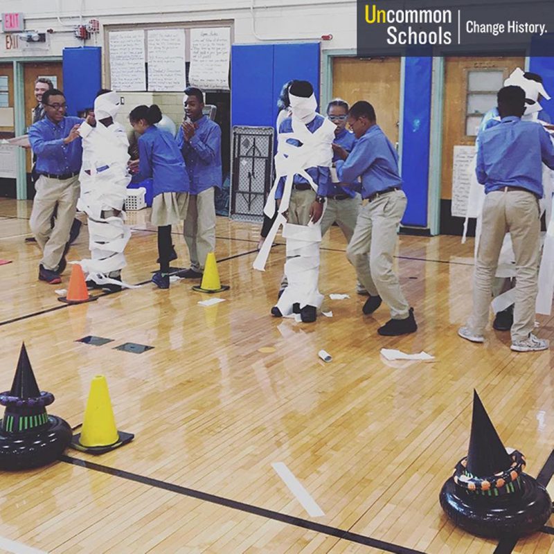 Students turn fellow classmates into mummies with toilet paper