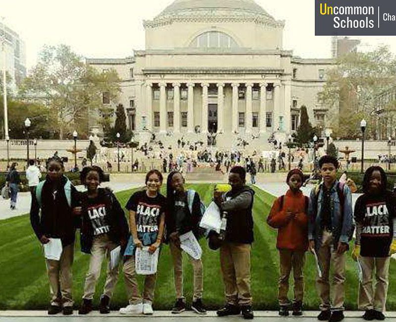Students pose in "Black Lives Matter" shirts at Columbia University