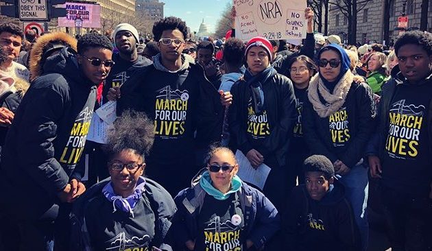 Students pose stoically at March for our Lives rally
