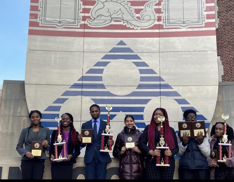 Washington Park high school speech team pose with their trophies