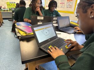 students working on laptops